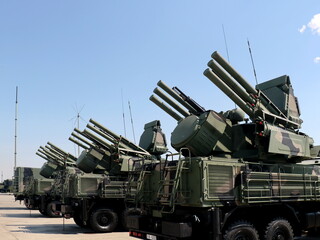 Artillery missile systems " Pancir-C1 " modern army industry, blue sky on background