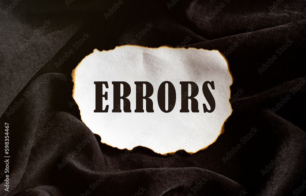 Poster burned paper on a black background with text errors