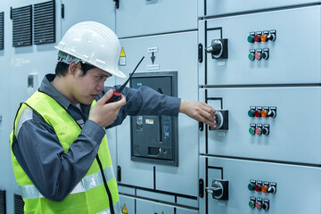 electrician working in a factory. electrician at work. electrician working in a power station