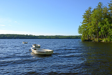 Boats on Messalonskee Lake, body of water in Belgrade Lakes region of Maine, United States