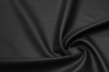black artificial leather with waves and folds on PVC base