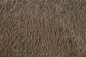 Brown concrete textured wall close-up