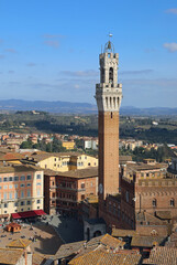 Fototapeta na wymiar Top view of Siena in ITALY with the Tower called DEL MANGIA and the Palio square