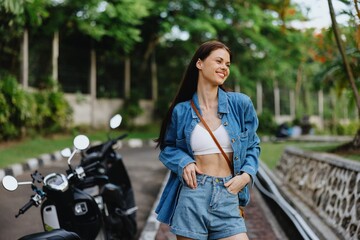 Fototapeta na wymiar Portrait of a woman brunette smile with teeth walking outside against a backdrop of palm trees in the tropics, summer vacations and outdoor recreation, the carefree lifestyle of a Generative AI