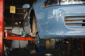 Mechanic in garage, Photo of car car repairing.