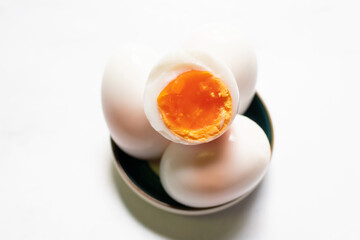 Boiled eggs on white table background.