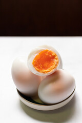 Boiled eggs on white table background.
