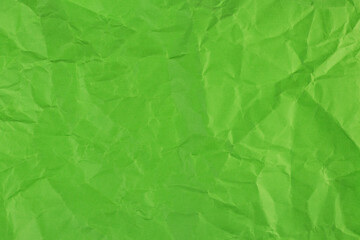 Green clumped paper texture background, carft paper board wrinked and rough material,