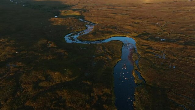 Buachaille Etive Mor and Rannoch Moor in Scottish Highlands. Aerial footage over River Coe 