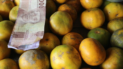 Pile of oranges in a fruit shop. Fresh orange for good juice.