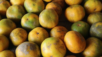 Pile of oranges in a fruit shop. Fresh orange for good juice.