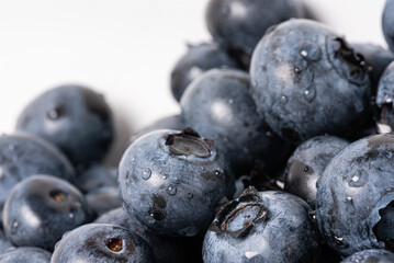 Blueberry fruit in close-up. Ripe fruit, blueberry berries isolated. Background with fruits.