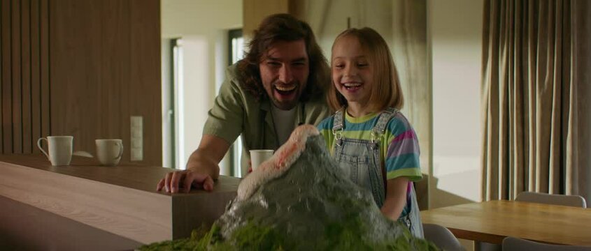 Father is helping his daughter to prepare a school science class volcano project, mixing vinegar and baking soda to imitate the eruption Generative AI