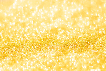 Gold glitter defocused texture background. gold christmas abstract background.