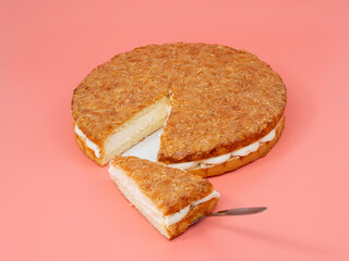 Bee sting cake, light cake with cream filling, with crispy almonds. Cake with almonds on a pink background.