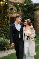 portrait of a young couple of bride and groom on their wedding day