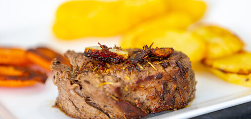 Filet mignon grilled with fine herbs and butter