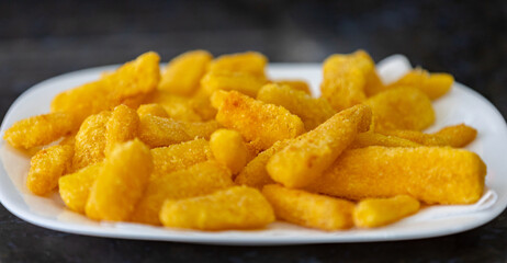 Traditional Brazilian fried cassava, typical bar snack