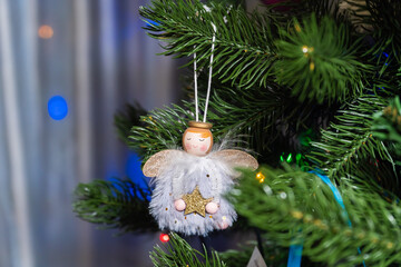 Russia. Kronstadt. January 19, 2023. Festive decoration in the form of a small angel on a Christmas tree.