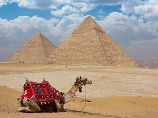 Egyptian pyramids in sand desert and clear sky