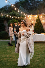 cheerful young bride at a banquet