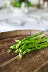Fresh asparagus on wooden background