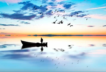 Fototapeten persona pasea en barca en su tiempo libre © kesipun