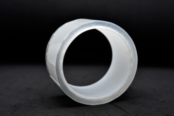 Adhesive tape on a black background. Rolls of transparent tape. Scotch tape on a black background.