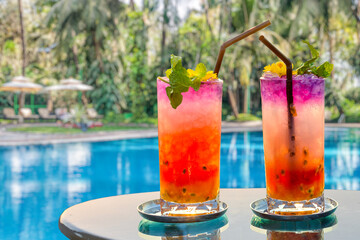 Colorful cocktails at a tropical resort swimming pool