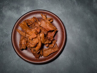 Crispy Fried Chicken Skin Appetizer on Plate for Beer Pairing