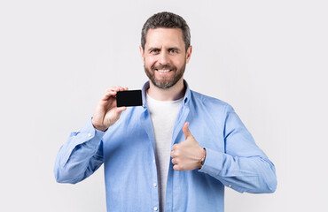 man holding business card show thumb up. photo of man hold business card.