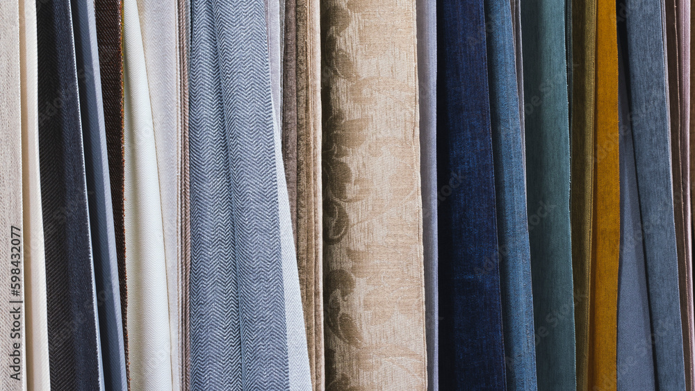 Poster mix colorful hanging vertical stripe textile, fabrics, cloths on the rack. texture of multicolored f