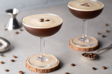 Espresso Martini cocktail boozy vodka, coffee liquor, espresso and syrup with coffee beans as...