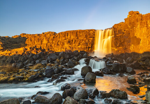 &Ouml;xar&aacute;rfoss Waterfall at sunrise in Thingvellir National Park, Selfoss, Iceland