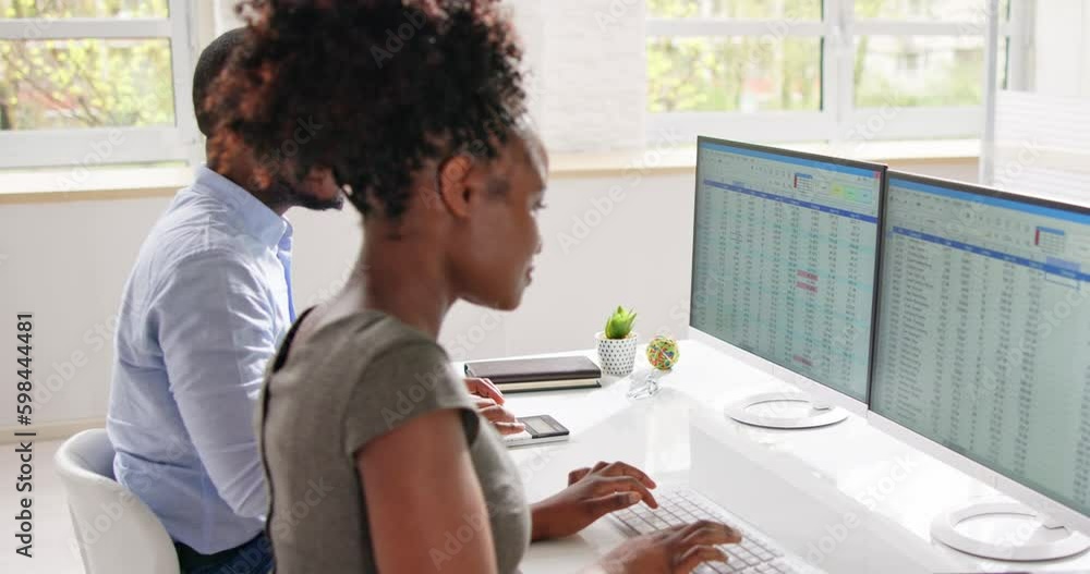 Poster analyst employee working on spreadsheet