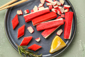 Plate with tasty crab sticks on light background, closeup © Pixel-Shot