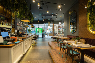 Interior of a luxury restaurant with flower decorated walls
