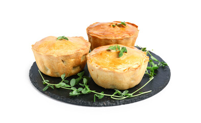 Slate board with tasty meat pot pies on white background