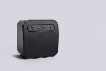 Wireless modern speaker on grey background