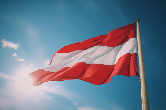 Austria flag flying on the blue sky