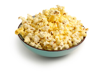 Bowl with crispy popcorn on white background