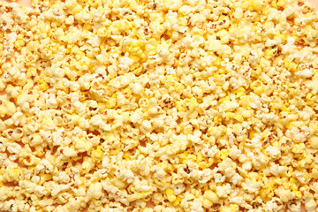 Crispy popcorn as background, closeup
