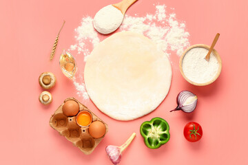 Fototapeta na wymiar Raw dough and ingredients for preparing vegetable pie on pink background