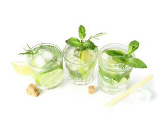 Glasses of tasty mojito isolated on white background