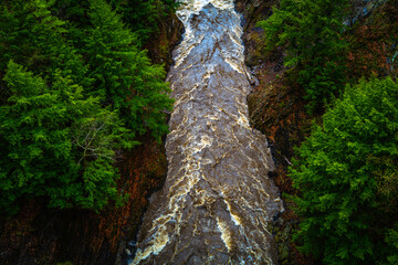 Quechee Gorge over the Ottauquechee River in Hartford, Vermont, USA, flooded rapid flow after rain storm