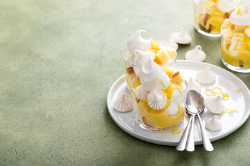 Fototapeta na wymiar Lemon meringue and pound cake trifle in a glass