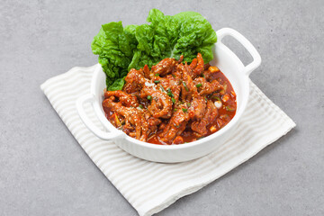 Chicken feet seasoned with vegetables.