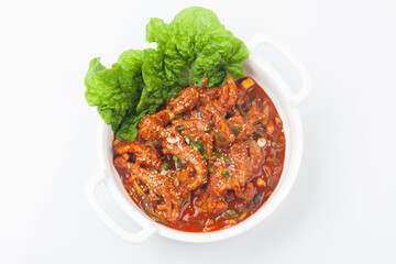 Chicken feet seasoned with vegetables.