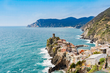 Scenic view of ocean and Vernazza village located in Cinque Terre, Italy