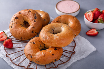 Variety of bagels served with strawberry cream chees and fresh berries